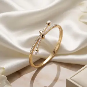 Luxe Gold Knot Bangle with Pearl & Crystal Details